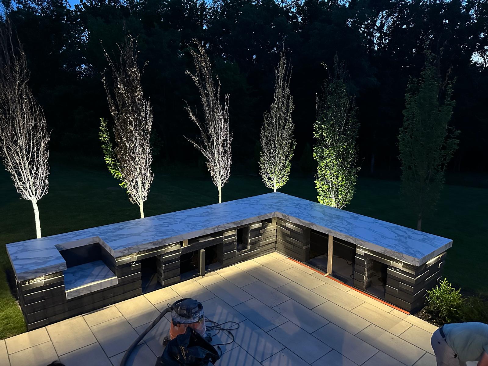 Luxury custom outdoor kitchen with marble countertops